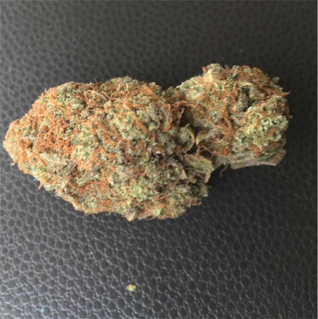 818 OG marijuana strain flower with pungent and lavender flavor and sleepy / relaxed effects - Rare Harvest indica