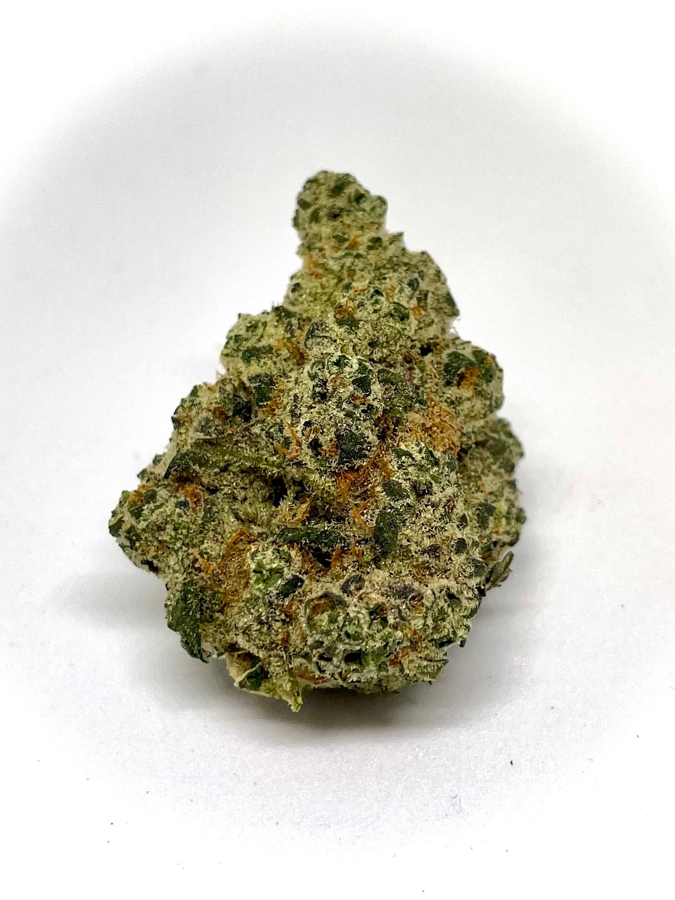 Milkman marijuana strain flower with blueberry and strawberry flavor and creative / energetic effects - Rare Harvest indica