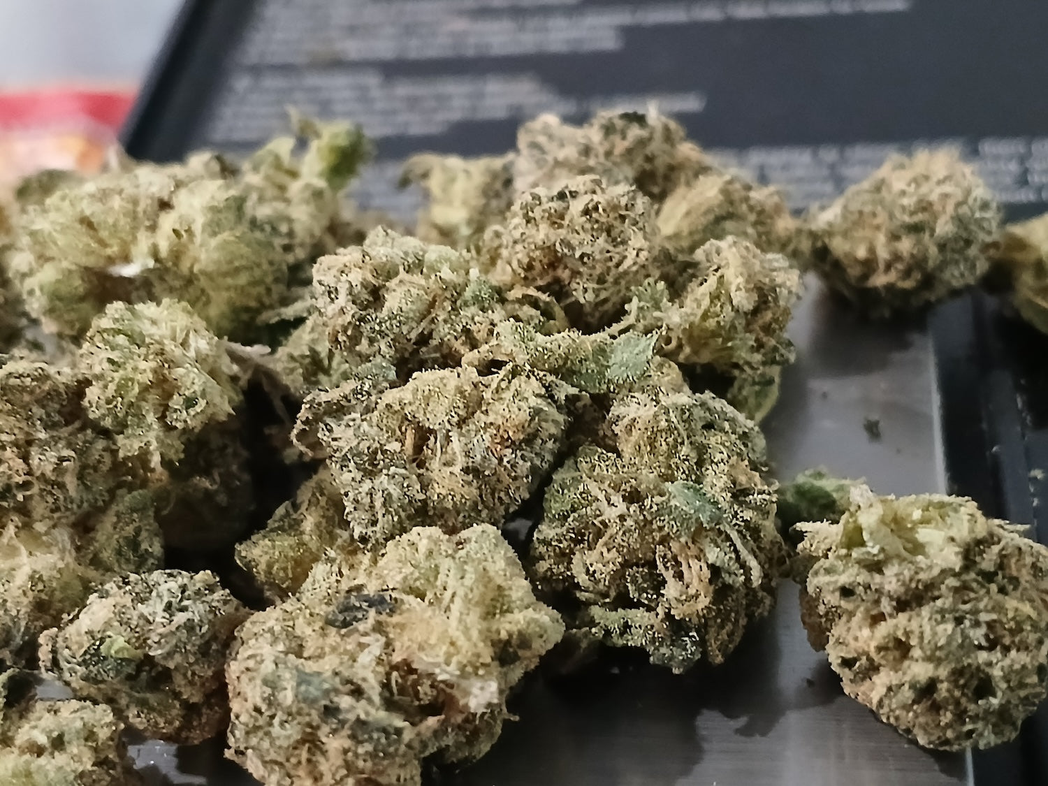 Casino Kush marijuana strain flower with nutty and diesel flavor and sleepy / relaxed effects - Rare Harvest hybrid