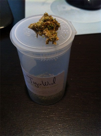 Tiger Woods marijuana strain flower with sweet and pungent flavor and energetic / giggly effects - Rare Harvest hybrid