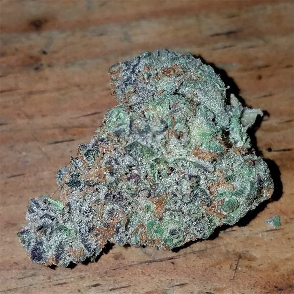 Abusive OG marijuana strain flower with earthy and tea flavor and sleepy / relaxed effects - Rare Harvest indica
