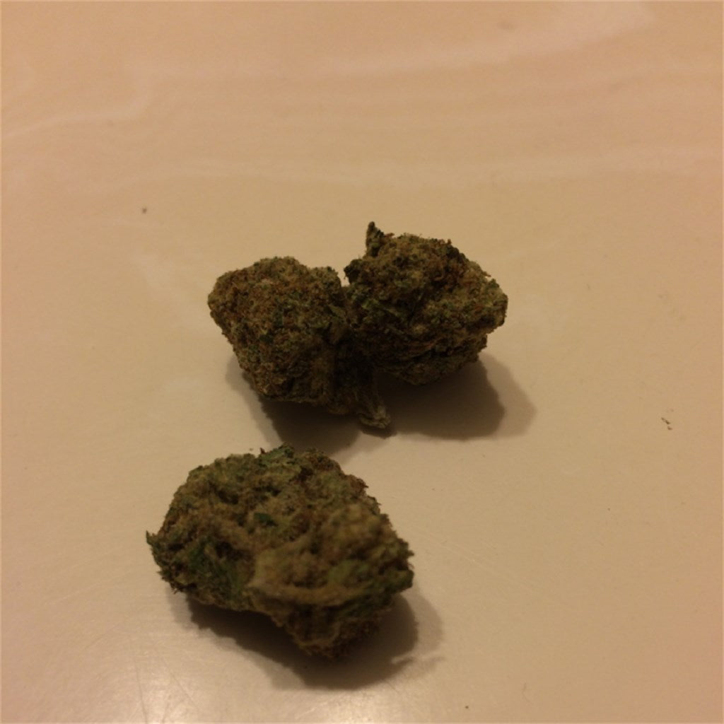 Alpha Express marijuana strain flower with diesel and berry flavor and energetic / uplifted effects - Rare Harvest sativa