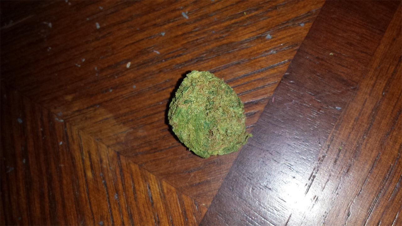 Bakerstreet marijuana strain flower with woody and earthy flavor and relaxed / sleepy effects - Rare Harvest indica