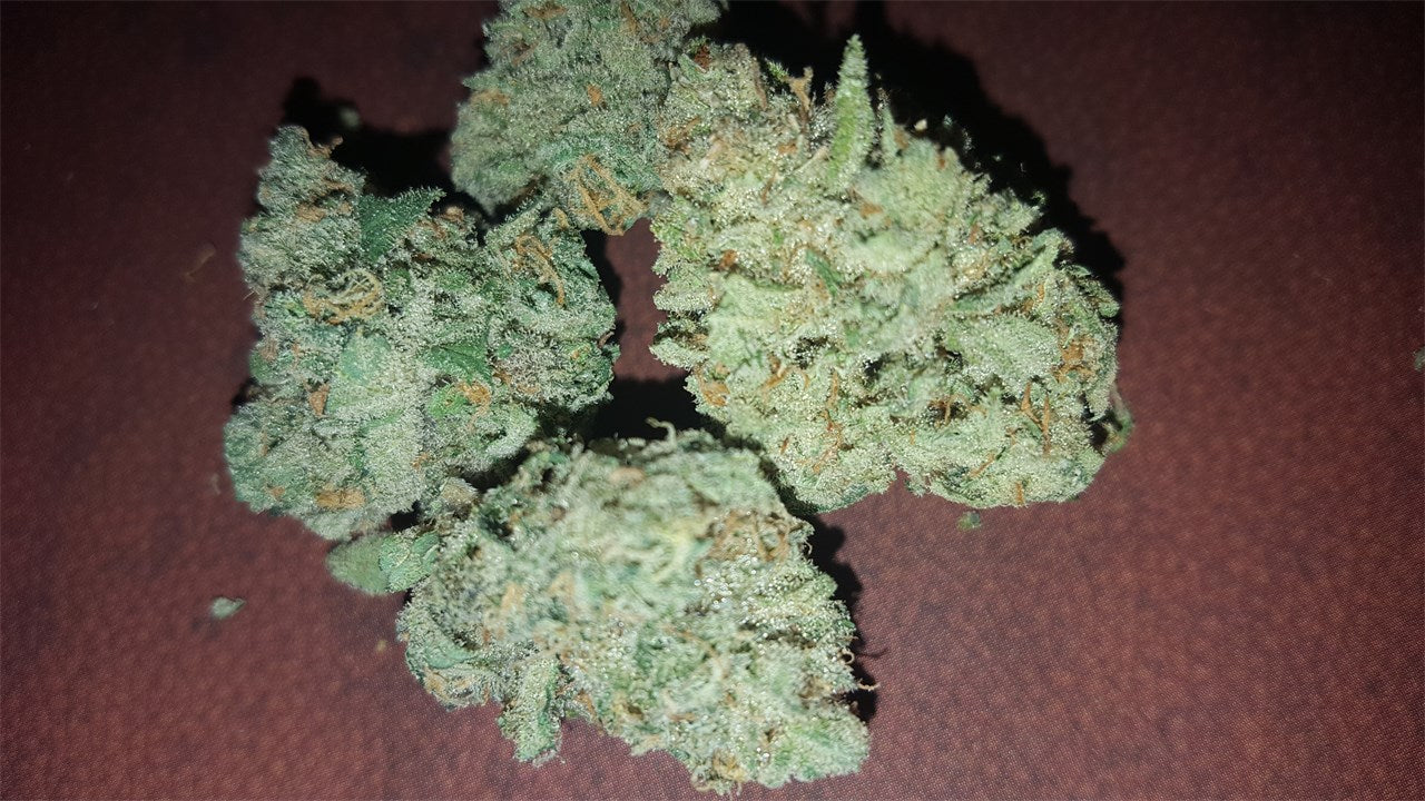 Big Smooth marijuana strain flower with blueberry and pepper flavor and relaxed / happy effects - Rare Harvest hybrid