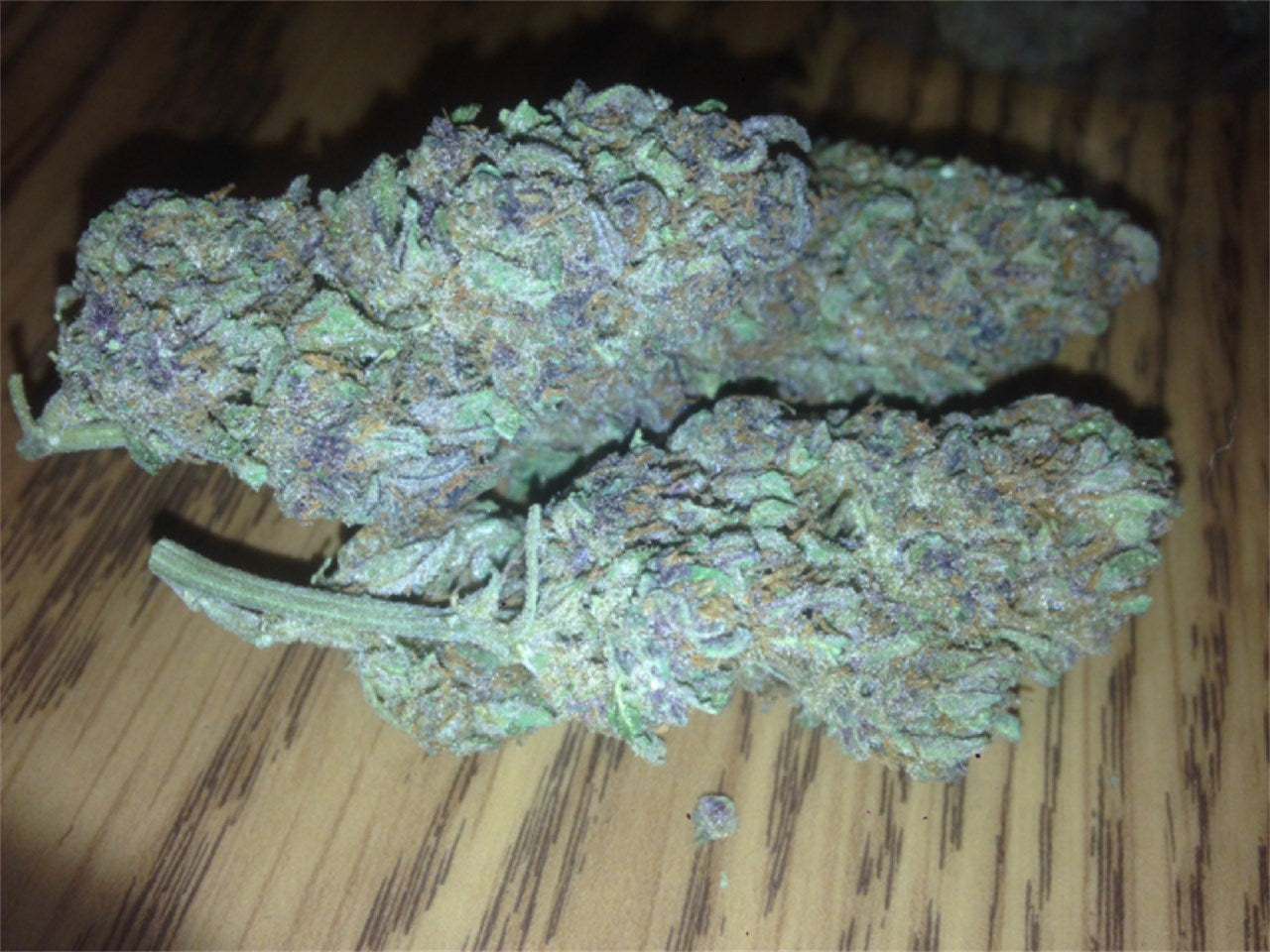 Black Cherry OG marijuana strain flower with tea and tree fruit flavor and relaxed / sleepy effects - Rare Harvest indica