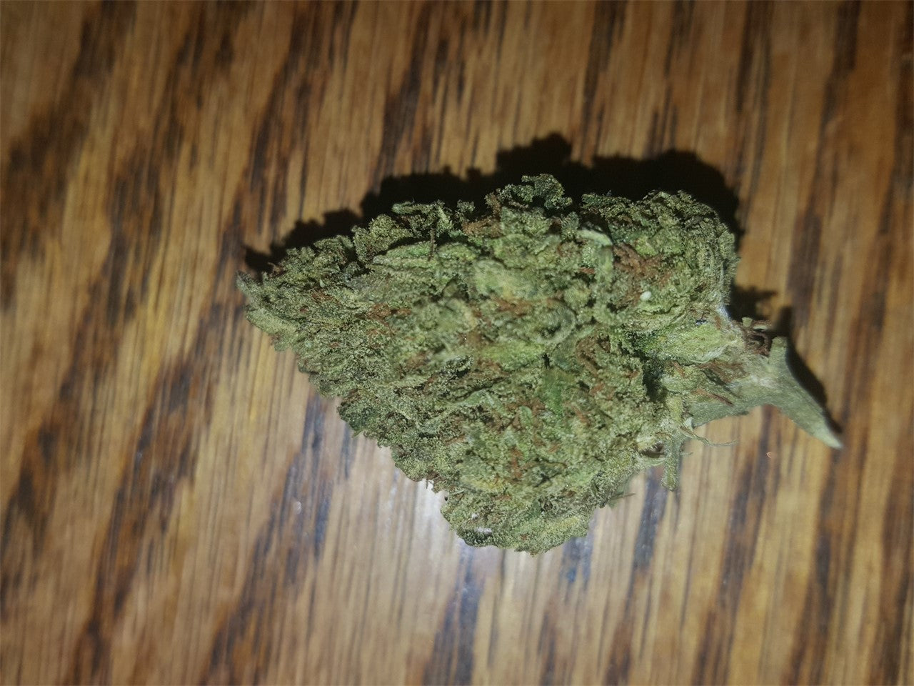 Blackberry Trainwreck marijuana strain flower with berry and lavender flavor and creative / euphoric effects - Rare Harvest hybrid
