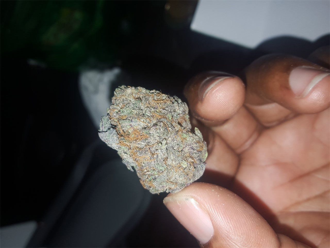 Blue Dynamite marijuana strain flower with blueberry and berry flavor and relaxed / sleepy effects - Rare Harvest indica