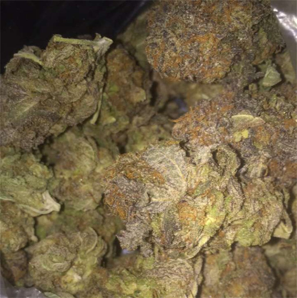 Blue Moon Rocks marijuana strain flower with lavender and flowery flavor and giggly / euphoric effects - Rare Harvest hybrid