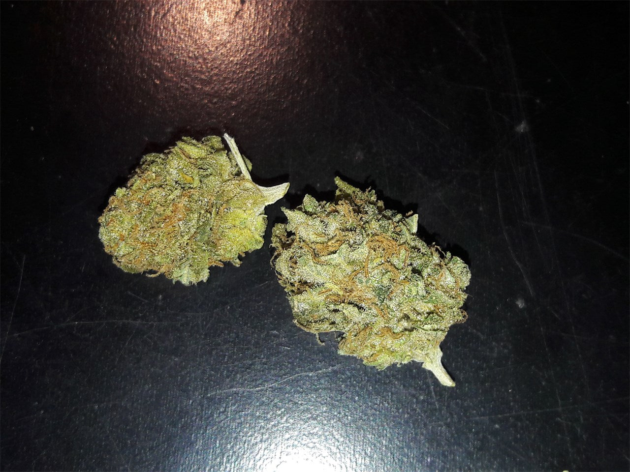 Caramel Candy Kush marijuana strain flower with butter and coffee flavor and happy / creative effects - Rare Harvest hybrid