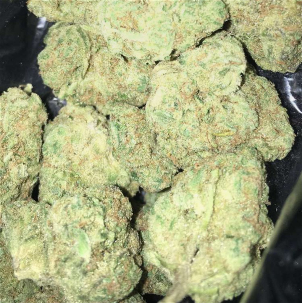 Chem Crush marijuana strain flower with pungent and tropical flavor and energetic / creative effects - Rare Harvest hybrid
