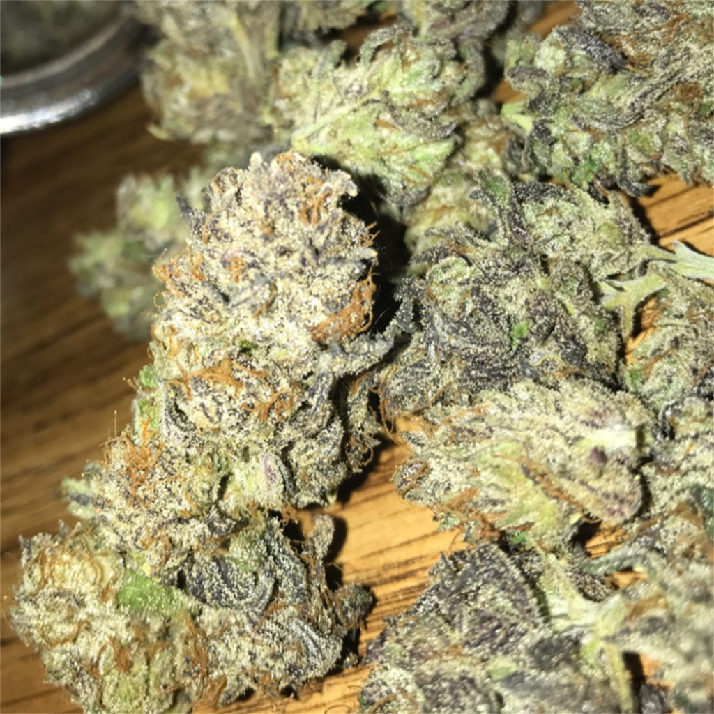 Cherry OG marijuana strain flower with tree fruit and berry flavor and hungry / relaxed effects - Rare Harvest hybrid
