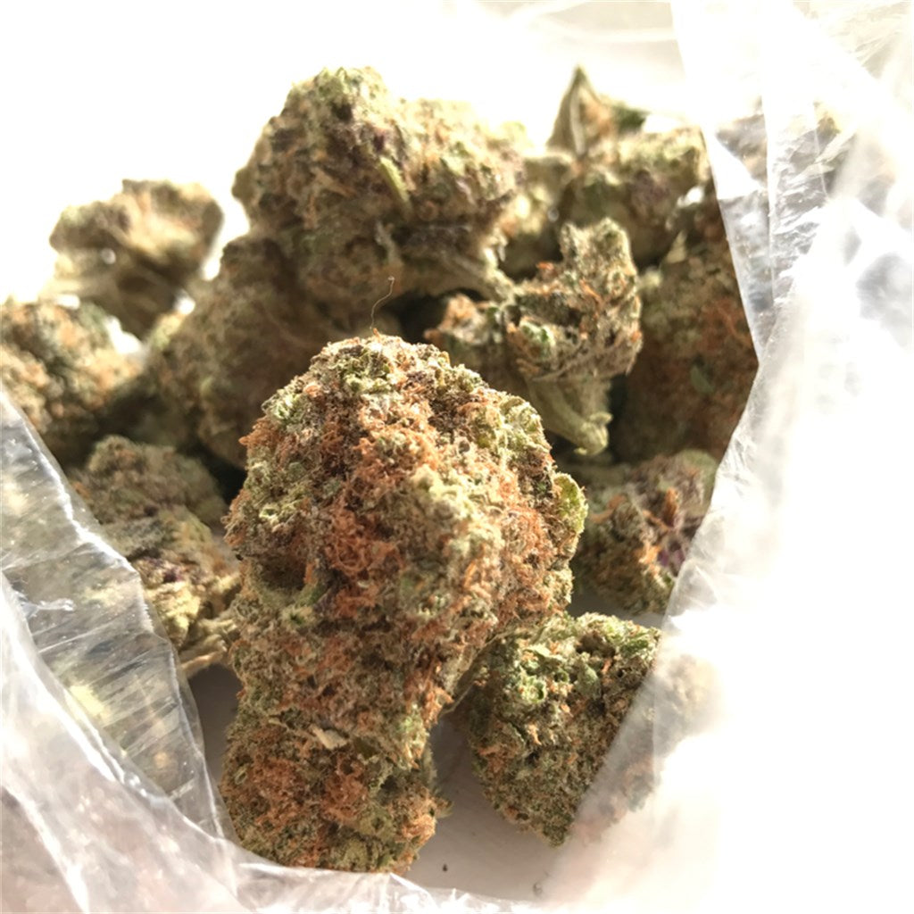 Clementine Kush marijuana strain flower with citrus and orange flavor and happy / creative effects - Rare Harvest hybrid