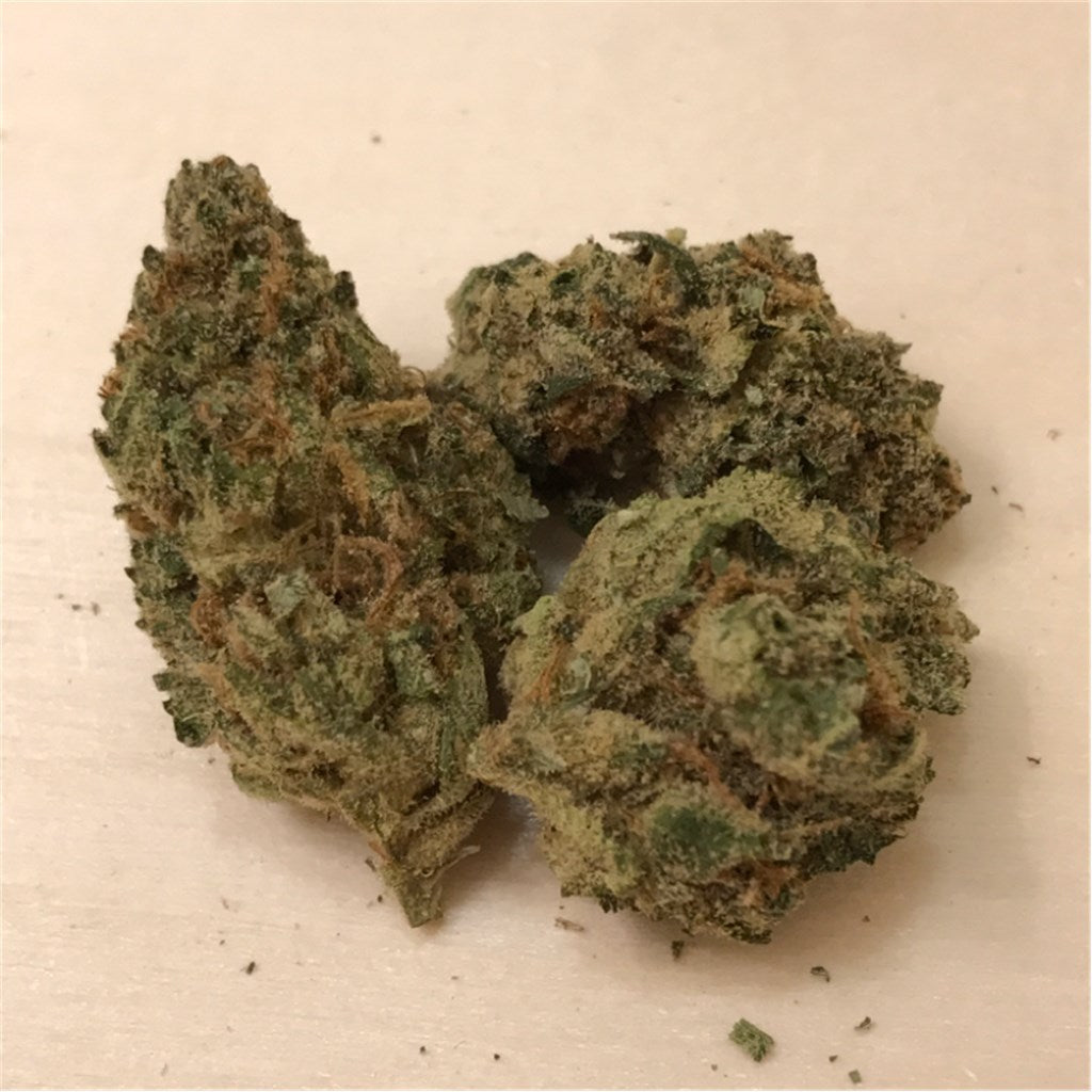 Deep Sleep marijuana strain flower with pungent and earthy flavor and sleepy / relaxed effects - Rare Harvest indica