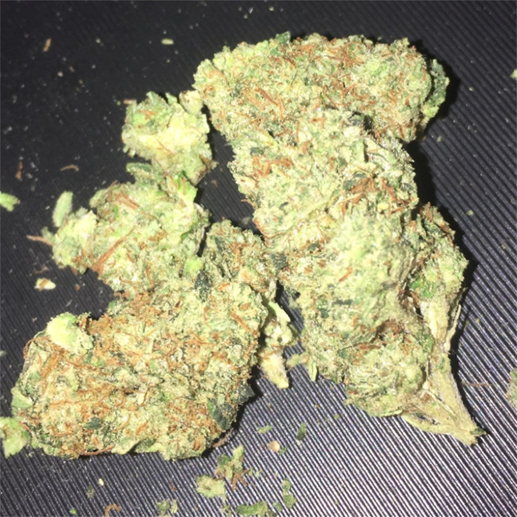 Diamond OG marijuana strain flower with pine and woody flavor and sleepy / relaxed effects - Rare Harvest indica