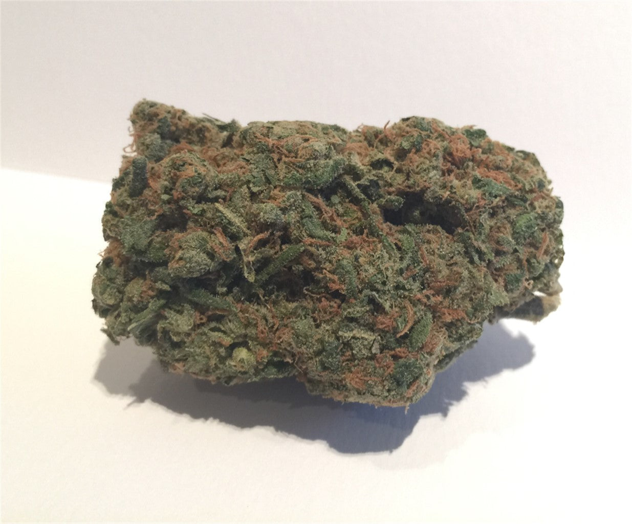 Digweed marijuana strain flower with chemical and strawberry flavor and uplifted / energetic effects - Rare Harvest indica