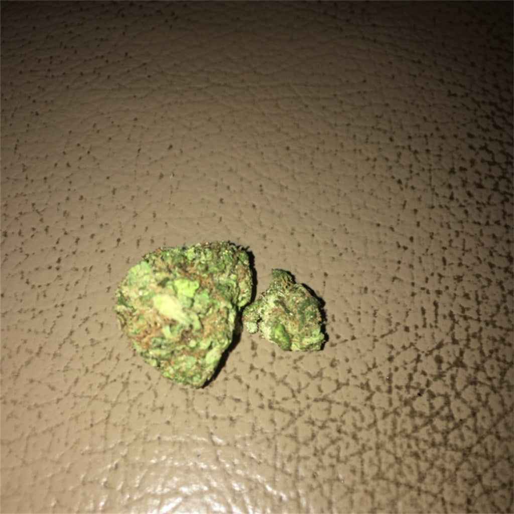 Dolla Sign OG Kush marijuana strain flower with sweet and pungent flavor and energetic / creative effects - Rare Harvest indica
