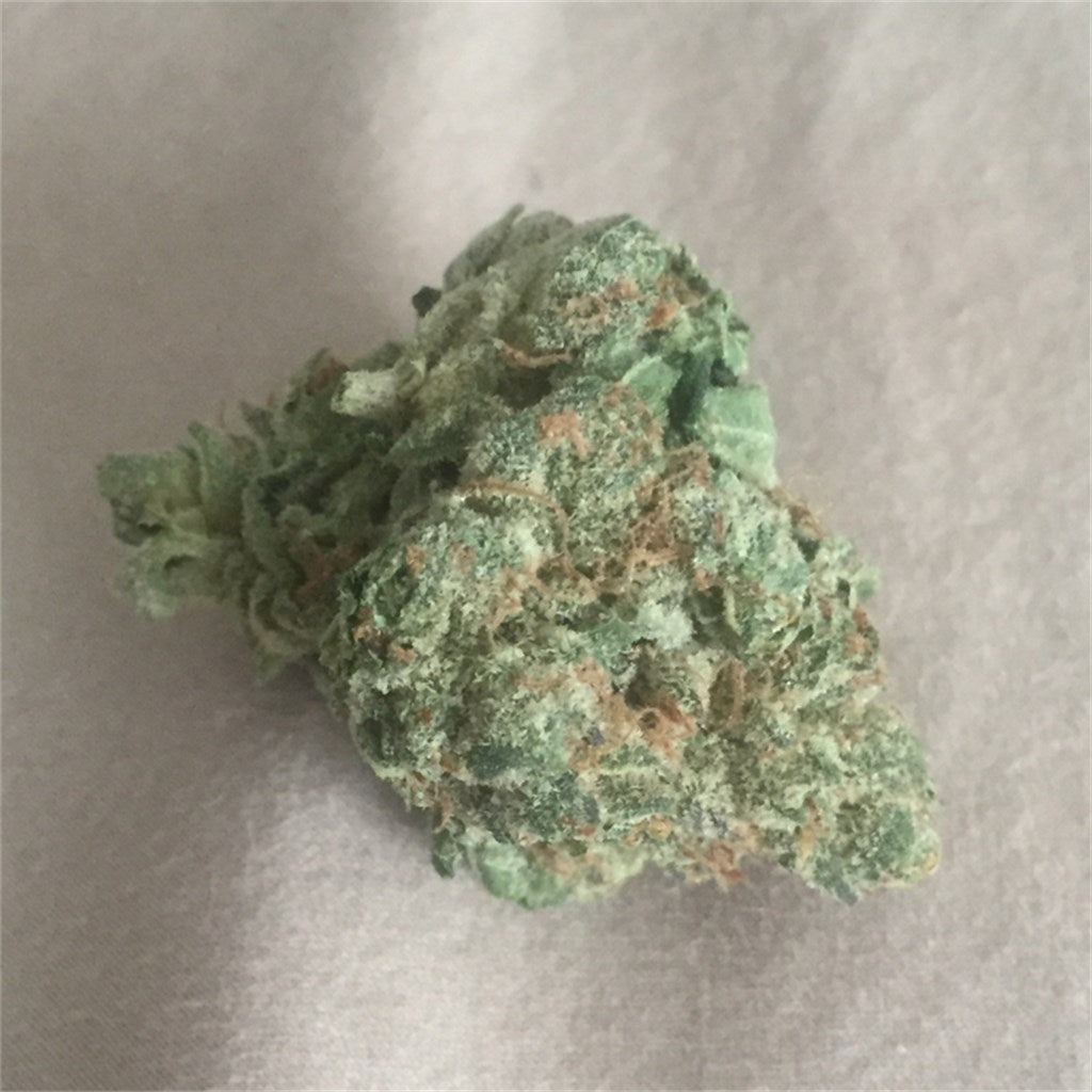 Double Tangie Banana marijuana strain flower with orange and tropical flavor and talkative / uplifted effects - Rare Harvest hybrid
