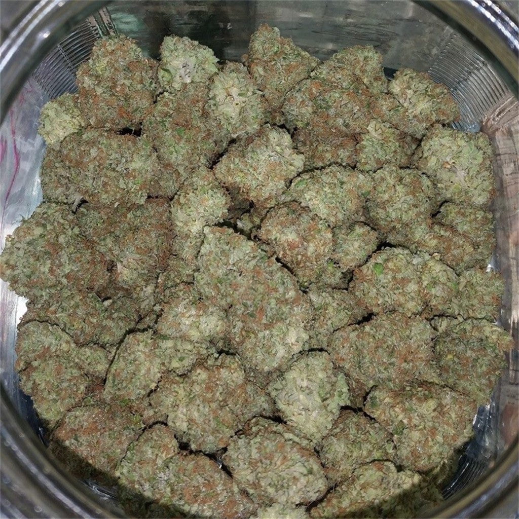 Red Pop marijuana strain flower with strawberry and berry flavor and giggly / happy effects - Rare Harvest indica