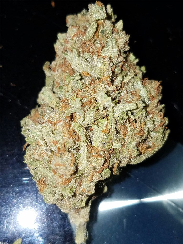 Goo marijuana strain flower with berry and tar flavor and sleepy / relaxed effects - Rare Harvest indica