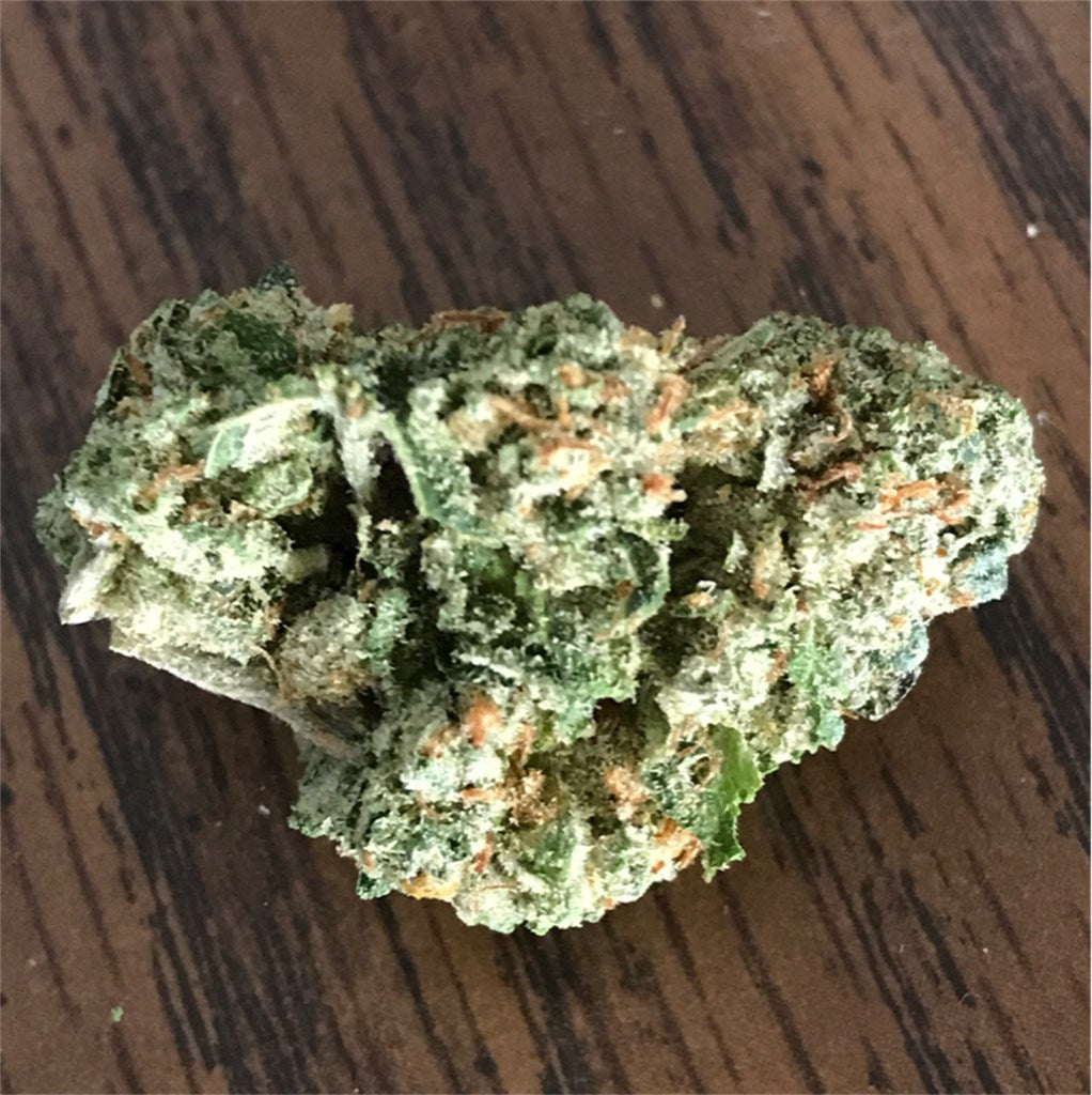 Grandpa Larry OG marijuana strain flower with grape and pungent flavor and relaxed / sleepy effects - Rare Harvest indica
