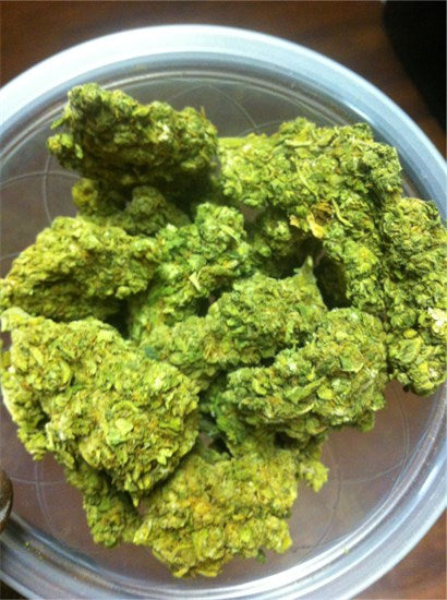 Green Door Kush marijuana strain flower with lemon and sweet flavor and creative / energetic effects - Rare Harvest hybrid