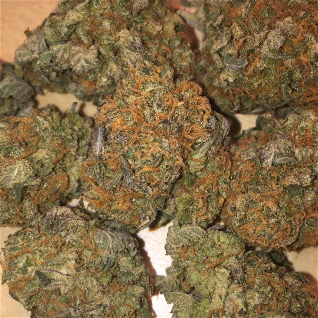 Guava Kush marijuana strain flower with tropical and tree fruit flavor and relaxed / happy effects - Rare Harvest hybrid