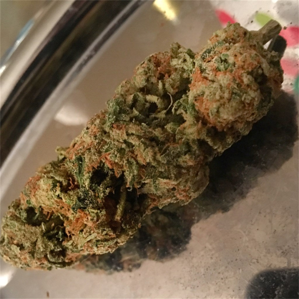 Hawaiian Fire marijuana strain flower with tropical and strawberry flavor and uplifted / energetic effects - Rare Harvest hybrid