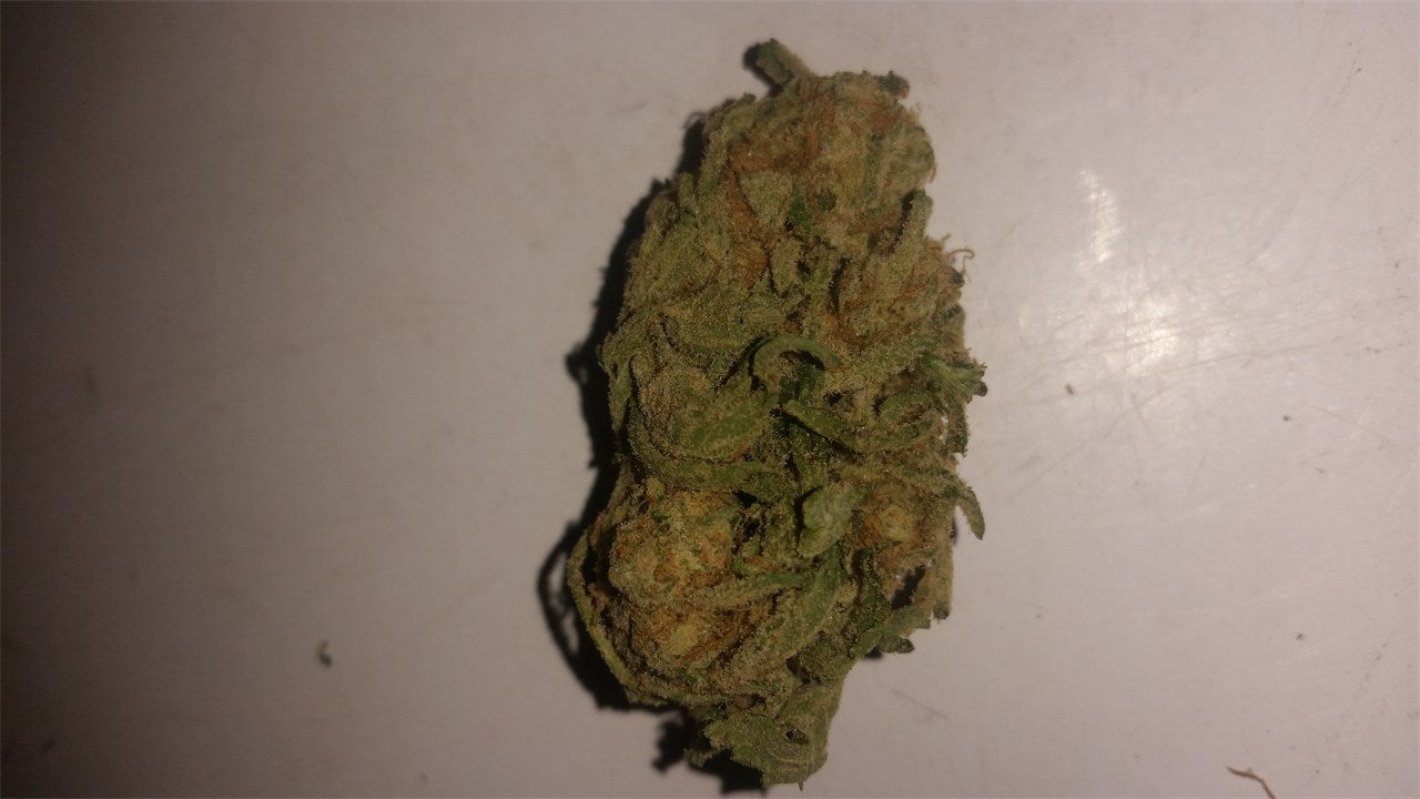 Hellfire OG marijuana strain flower with citrus and earthy flavor and euphoric / relaxed effects - Rare Harvest hybrid