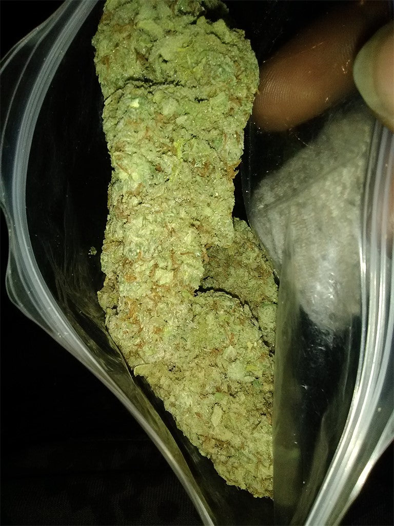 Higher Power marijuana strain flower with grape and grapefruit flavor and energetic / creative effects - Rare Harvest sativa