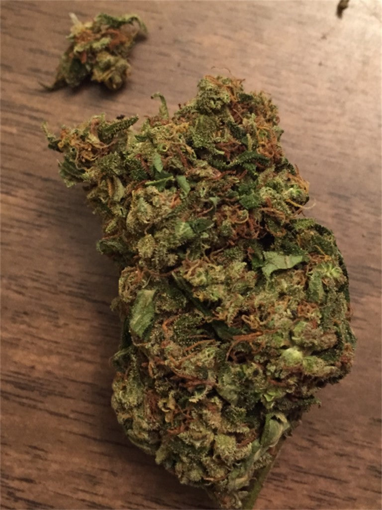J's Famous Kush marijuana strain flower with blueberry and grape flavor and energetic / uplifted effects - Rare Harvest hybrid
