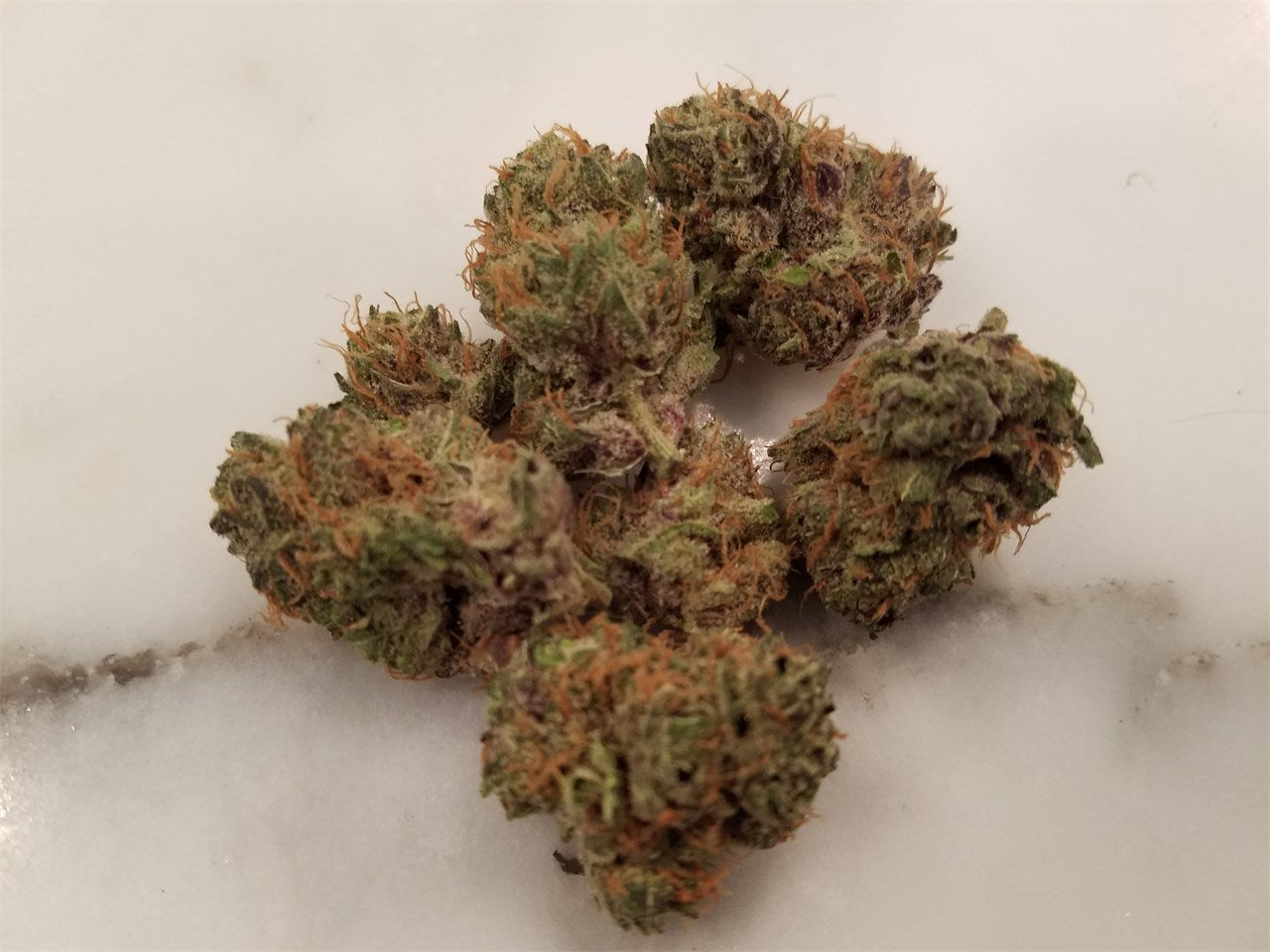 Katsu marijuana strain flower with woody and earthy flavor and sleepy / relaxed effects - Rare Harvest indica