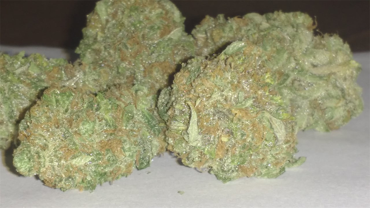 LAPD marijuana strain flower with diesel and pepper flavor and energetic / uplifted effects - Rare Harvest hybrid