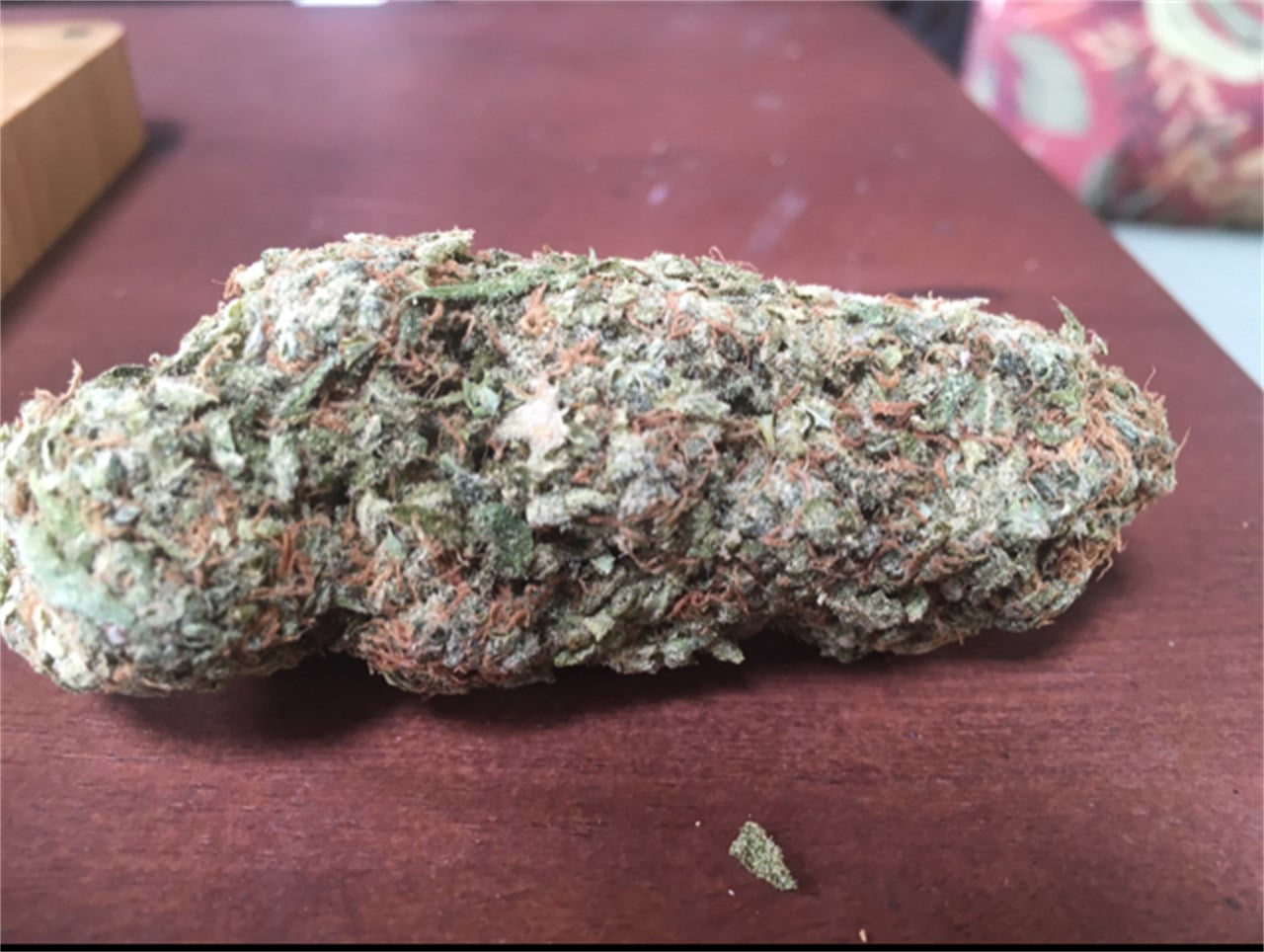 Laughing Buddha marijuana strain flower with tea and sage flavor and giggly / energetic effects - Rare Harvest sativa