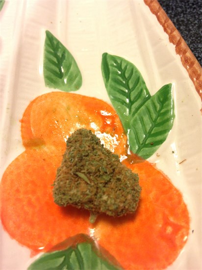 Lions Gate marijuana strain flower with sage and orange flavor and energetic / uplifted effects - Rare Harvest indica
