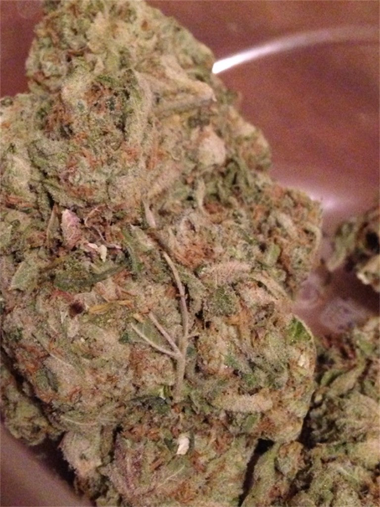 Mad Dawg marijuana strain flower with mint and pine flavor and happy / euphoric effects - Rare Harvest hybrid