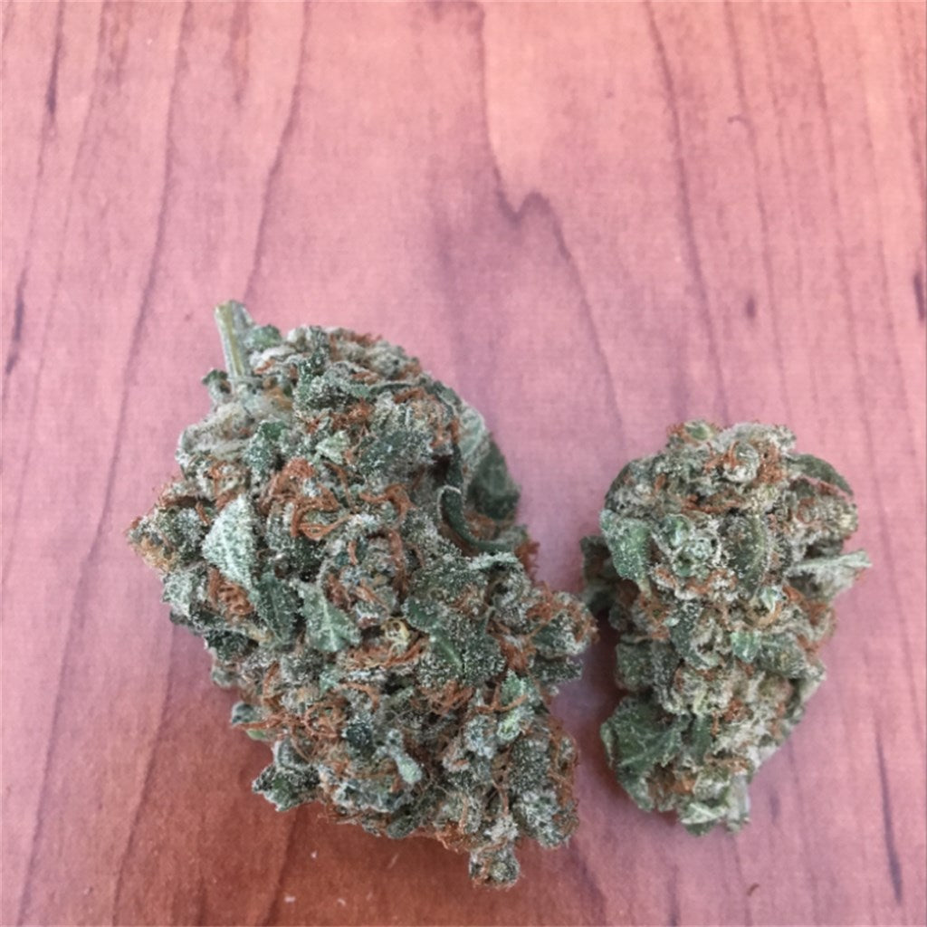 Marionberry Kush marijuana strain flower with berry and plum flavor and relaxed / happy effects - Rare Harvest hybrid