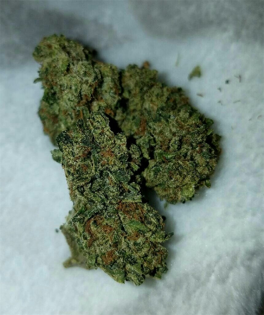 Mars OG marijuana strain flower with pungent and earthy flavor and sleepy / tingly effects - Rare Harvest indica