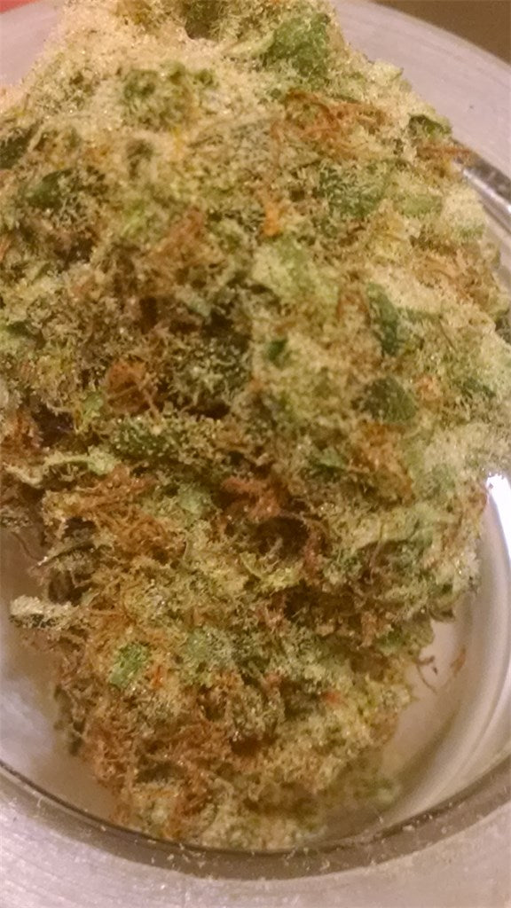 Medicine Man marijuana strain flower with flowery and berry flavor and tingly / focused effects - Rare Harvest hybrid