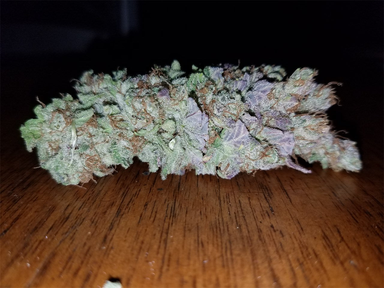 Medicine Woman marijuana strain flower with diesel and pine flavor and uplifted / creative effects - Rare Harvest hybrid