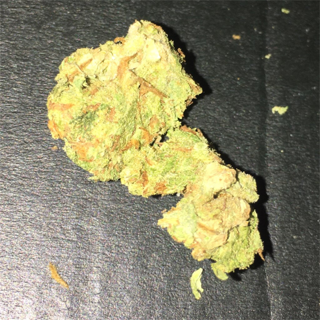 Mexican marijuana strain flower with tar and tobacco flavor and hungry / giggly effects - Rare Harvest sativa