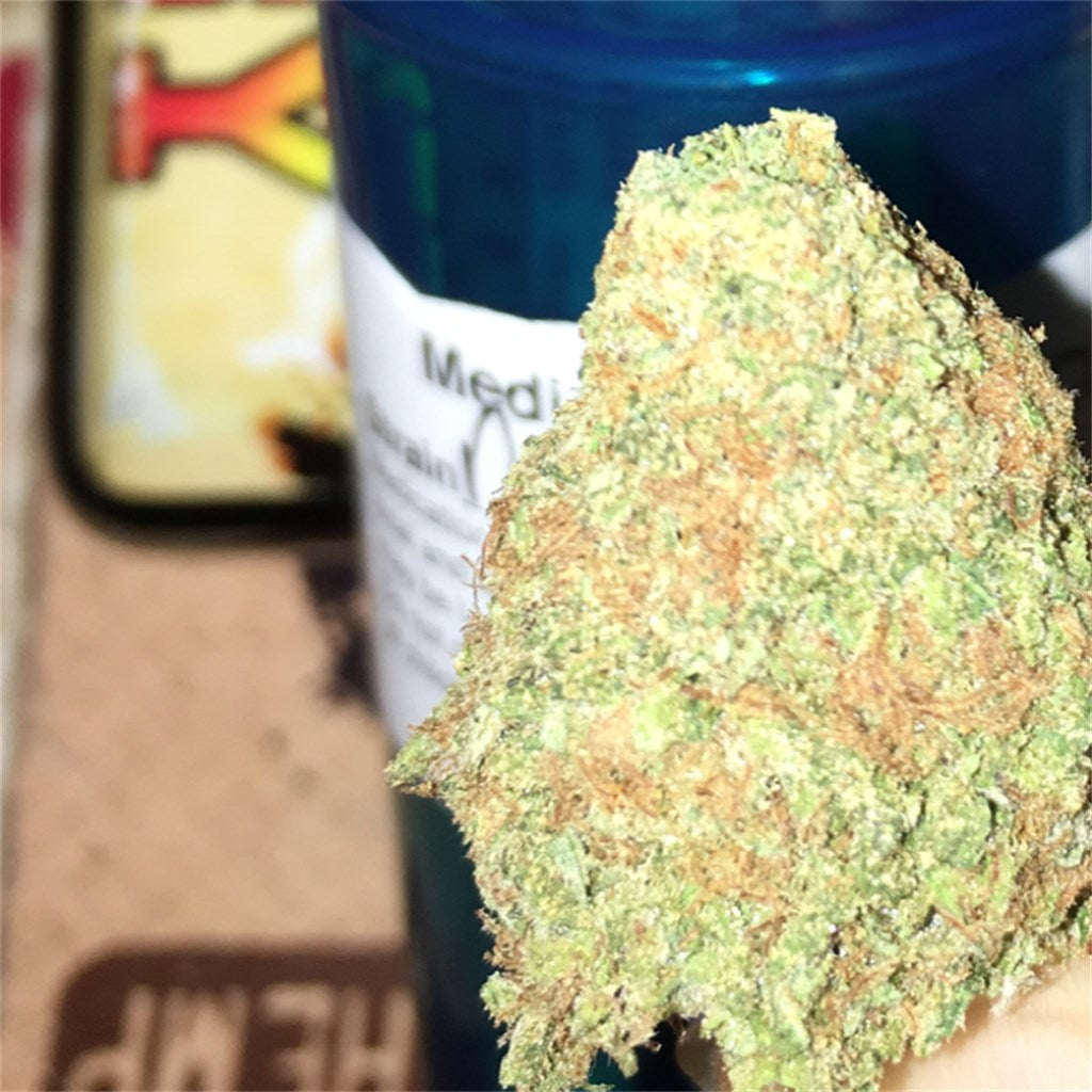 Michael Phelps OG marijuana strain flower with pear and diesel flavor and talkative / uplifted effects - Rare Harvest hybrid