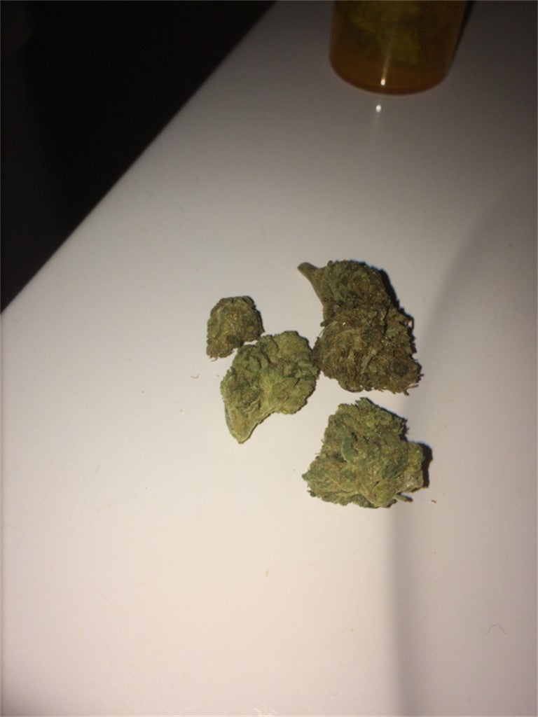 Mother’s Helper marijuana strain flower with earthy and sweet flavor and energetic / focused effects - Rare Harvest hybrid