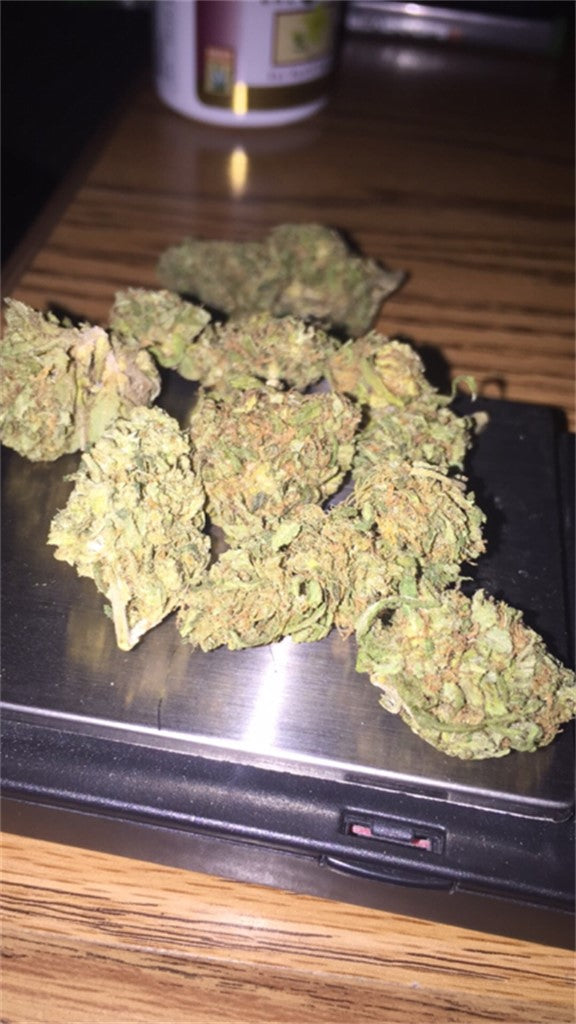Nurse Jackie marijuana strain flower with lemon and earthy flavor and focused / energetic effects - Rare Harvest sativa
