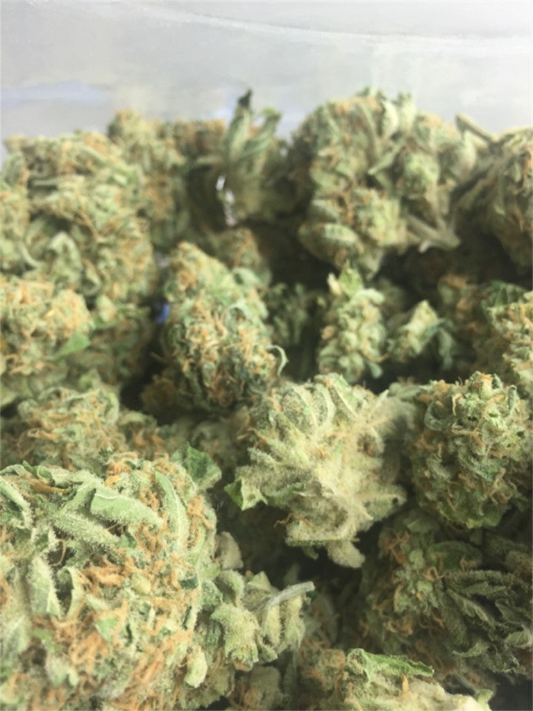 Pez marijuana strain flower with sweet and honey flavor and euphoric / sleepy effects - Rare Harvest indica