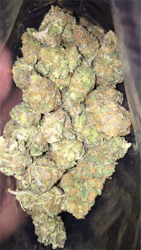 Pineapple Dog Shit marijuana strain flower with pineapple and blue cheese flavor and creative / uplifted effects - Rare Harvest hybrid