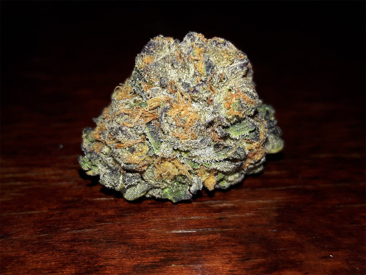 Pink Cookies marijuana strain flower with pepper and earthy flavor and tingly / relaxed effects - Rare Harvest hybrid