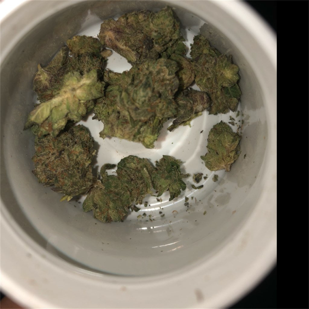 Pink Kush marijuana strain flower with rose and flowery flavor and relaxed / sleepy effects - Rare Harvest hybrid