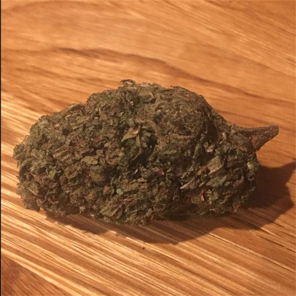 Platinum OG marijuana strain flower with earthy and pine flavor and sleepy / relaxed effects - Rare Harvest indica