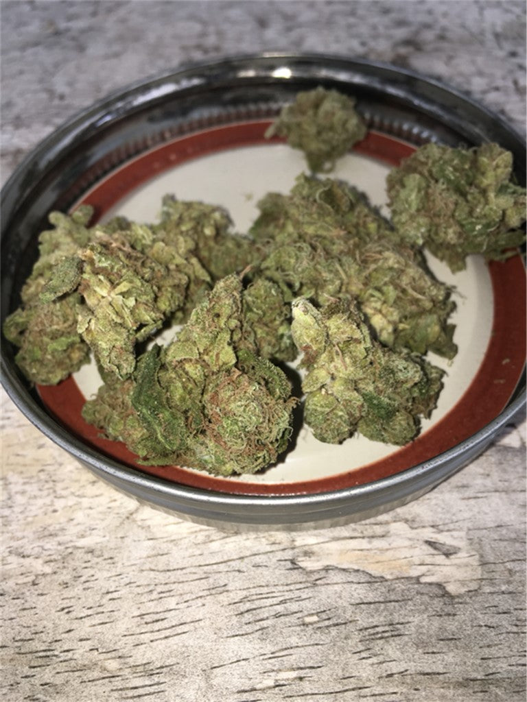 Popcorn Kush marijuana strain flower with butter and grapefruit flavor and hungry / sleepy effects - Rare Harvest indica