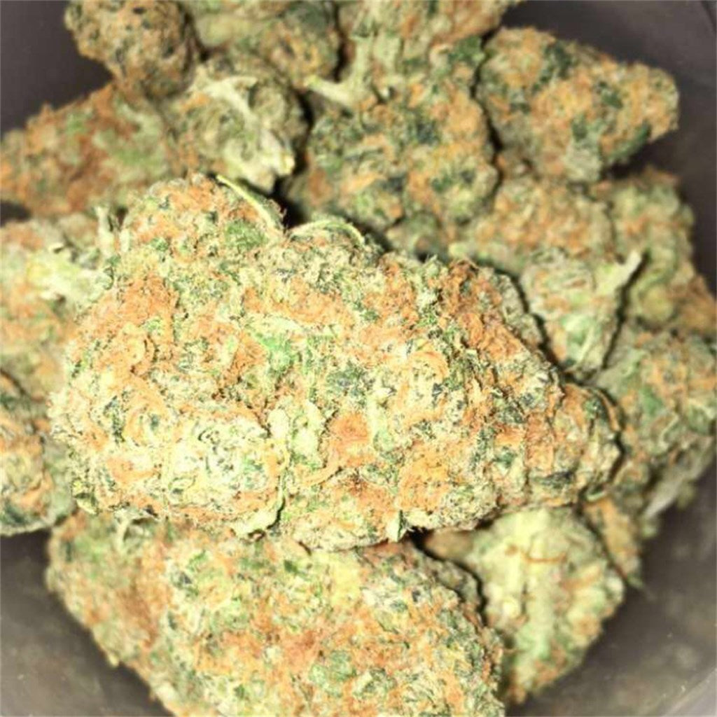 Power Kush marijuana strain flower with skunk and sweet flavor and sleepy / relaxed effects - Rare Harvest indica